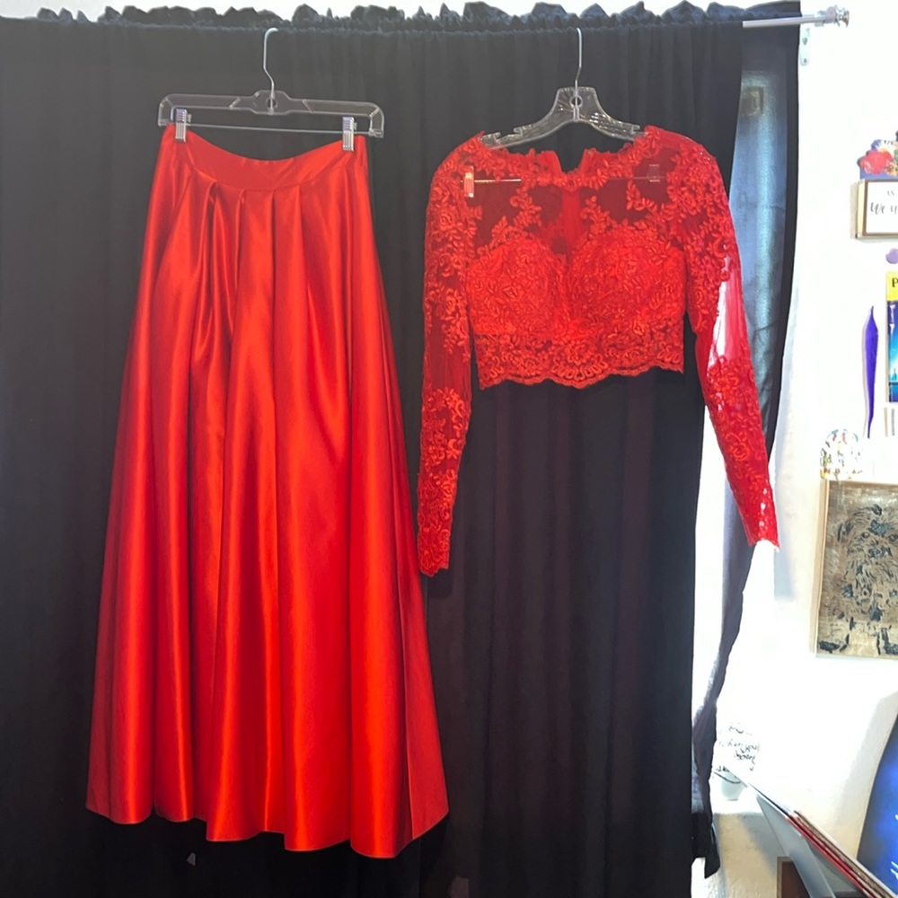 Beautiful 2 piece lace top and satin skirt.  Size 4.  Brand is TS Couture.